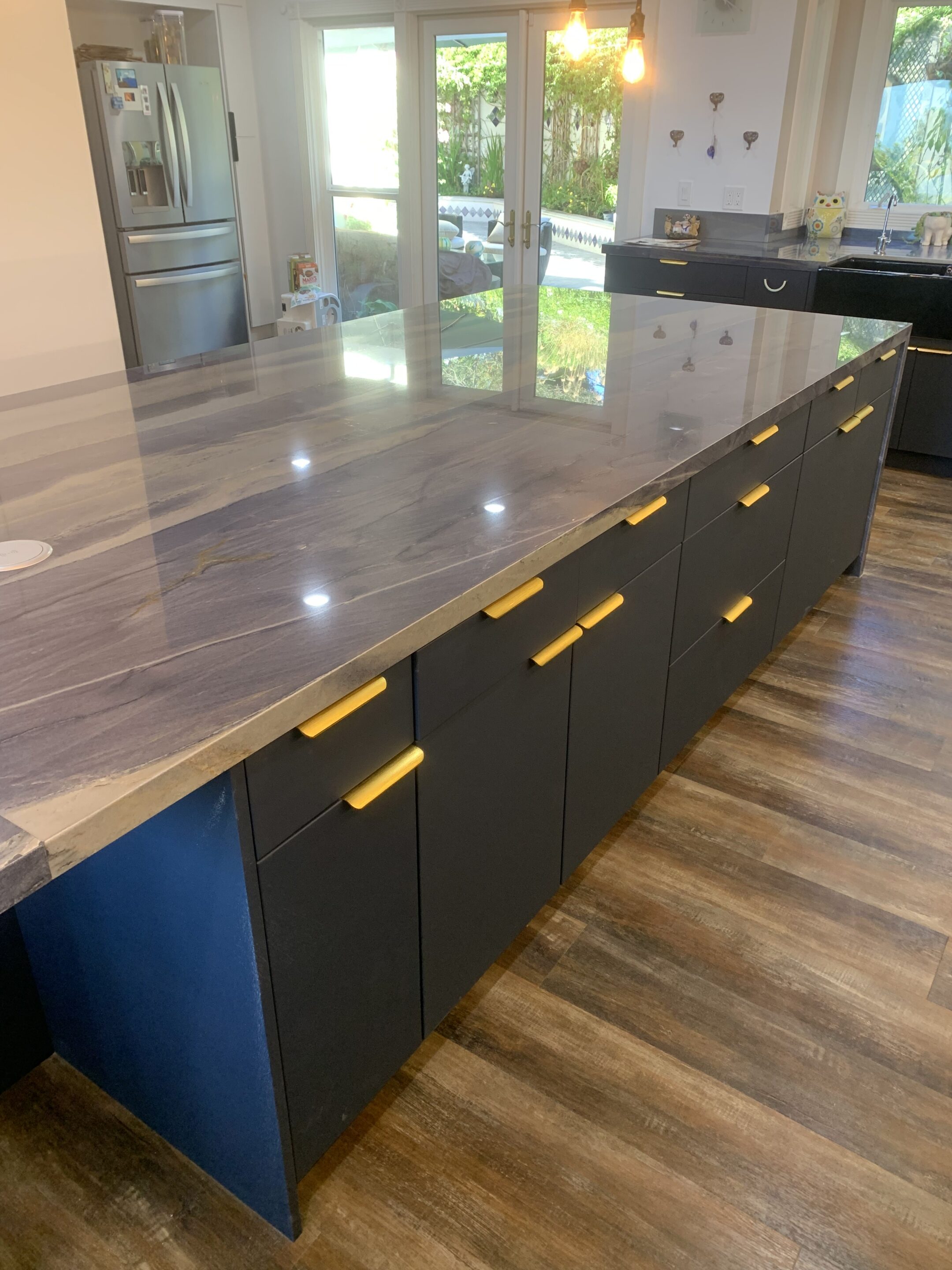 Navy kitchen island cabinets with brushed gold hardware, Anaheim, CA